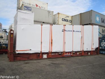 Grain dryer secured to flat rack